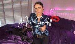 Scarlett's black leather pants and teal satin blouse