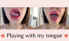 Sexy tongue play with pink lipstick