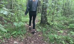 The girl was walking in the park in high-heeled shoes and wanted to go to the toilet, but on the way she fell and twisted her leg, which now hurts terribly