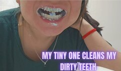 Cleaning my teeth with the help of my tiny