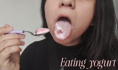 Slow and sensually eating yogurt