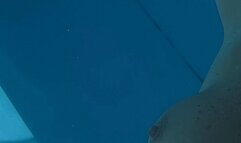 Carissa swimming nude in the pool set to music