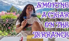 Smoking a cigar on the terrace
