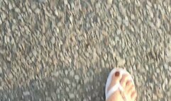 Angelin using his feet and flip-flops to pump car pedal (1)