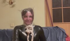 2 latex catsuits and plastic bag for 5 min masturbation