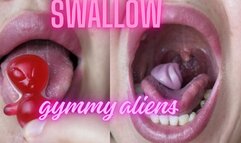 Swallow aliens gummy bears in
