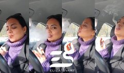 Car smoke in a purple turtleneck sweater