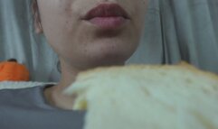 my stepsister eats and munches and then feels fat but continues to eat and feels good about herself but then wonders if it's a good idea to eat but still eats a big slice of bread and then eats it and then makes a silly face in 4k