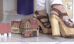 Buildings and Car under wooden High Heels floor view