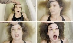 The guy POV holds Milana underwater