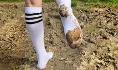 White knee high socks in mud, muddy stockings, black stockings in mud, girl in stockings in mud, white socks in mud, black stockings messy, dirty feet, dirty white socks