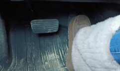 Evalynn driving the loaner in furry winter boots 1