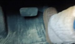 Evalynn driving the loaner in furry winter boots 2