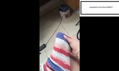 Sofii_hott itches feet out of fuzzy socks