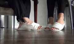 Wiggling our toes under the dining table in slippers c