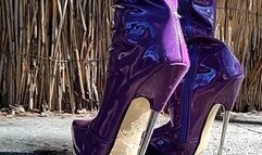ANIA - Purple shiny patent leather boots in action
