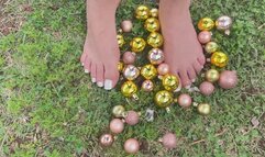 crushing Christmas baubles with your feet