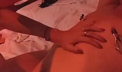 A homemade shot of your beautiful milf putting bells on her submissive's nipples