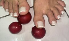 rubbing plums on my feet for you to taste.