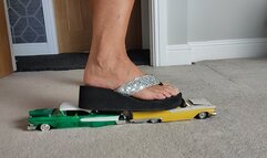 Nikkichick crushes 2 classic cars in flip flops with painted toe nails toy cars crush close ground view