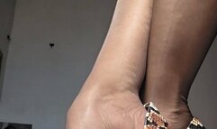 Milah Heel Popping her beautiful python stilettos off her highly arched feet