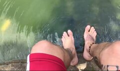 washing sweaty feet in the lake