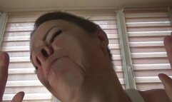 smeared face in glass