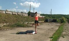 Sophie Trampling Her Slave In Red High Heels On The Concrete Floor