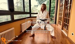 Petra indoor white gi posing and face kicks