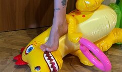 Nastya, barefoot and wearing beautiful black panties, sits on inflatable dinosaurs, sits on their faces, steps on them, tramples them, and walks on them. foot fetish, trampling, and barefoot