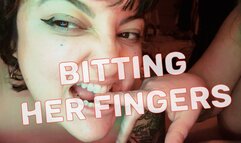 Bitting her fingers
