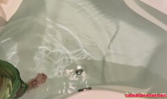 Carissa in the garden tub with gas mask—return to bathtub chronicles!