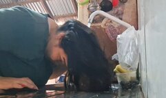 I wet my hair in the sink: An intimate ritual