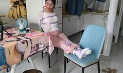 The straight arms of the girl with eyes were tied with silk to block her mouth ?Chinese Model)