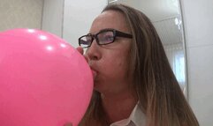 Inflating a large balloon until it explodes b