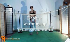 Daphne warming up karate and kung fu style