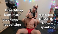 Holiday lights in our BDSM studio with breath play, latex mask, spike roller, facesitting, spanking with prickly tenderness, pissing, lingerie, stockings, licking, foot fetish, sucking, trampling with My Mistress GospodaricaEmma and Her sub Wolfy01