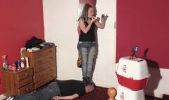 Sophie Applying Her Lip Gloss & Lip Stick Whilst Standing On Her Slaves Head In Boots