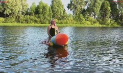 Alla hotly fucks a big inflatable rocket on the lake