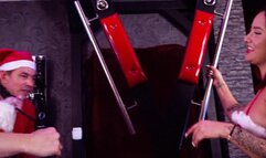 Santa Claus gets his ass spanked by two Christmas ladies