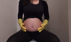 My Indian Pregnant Stepsister sits on the toilet in yellow dishwashing gloves and masturbates on the toilet