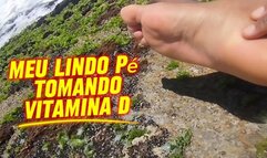 Meu lindo pe tomando banho de Sol na praia