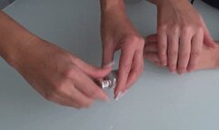 videos of women rubbing lotion on their hands d