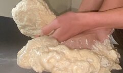 Bare feet trapped in hardened expanding foam