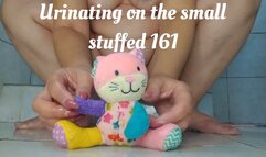 Urinating on the small stuffed 161