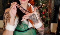 Christmas Elf shows your their toys