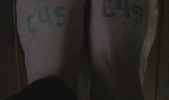 STINKY FEET ON A CHESTNUT WOODEN FLOOR