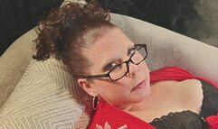 Sitting back in my red robe and black lacy bra smoking VS 120, teasing once again