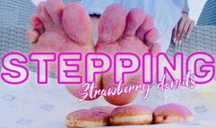 Stepping strawberry donuts with bare foot