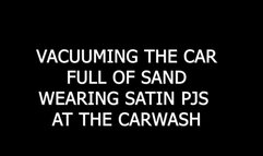Vacuuming the car full of sand wearing satin pjs at the car wash